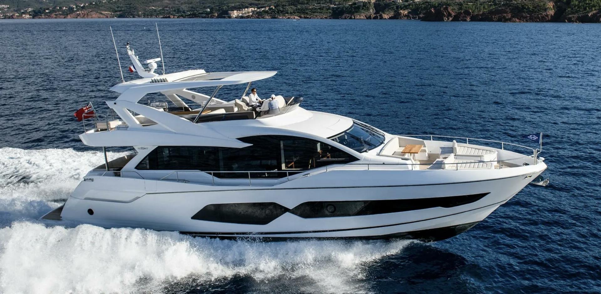 a white yacht on the water aboard 5 MARES Yacht for Sale