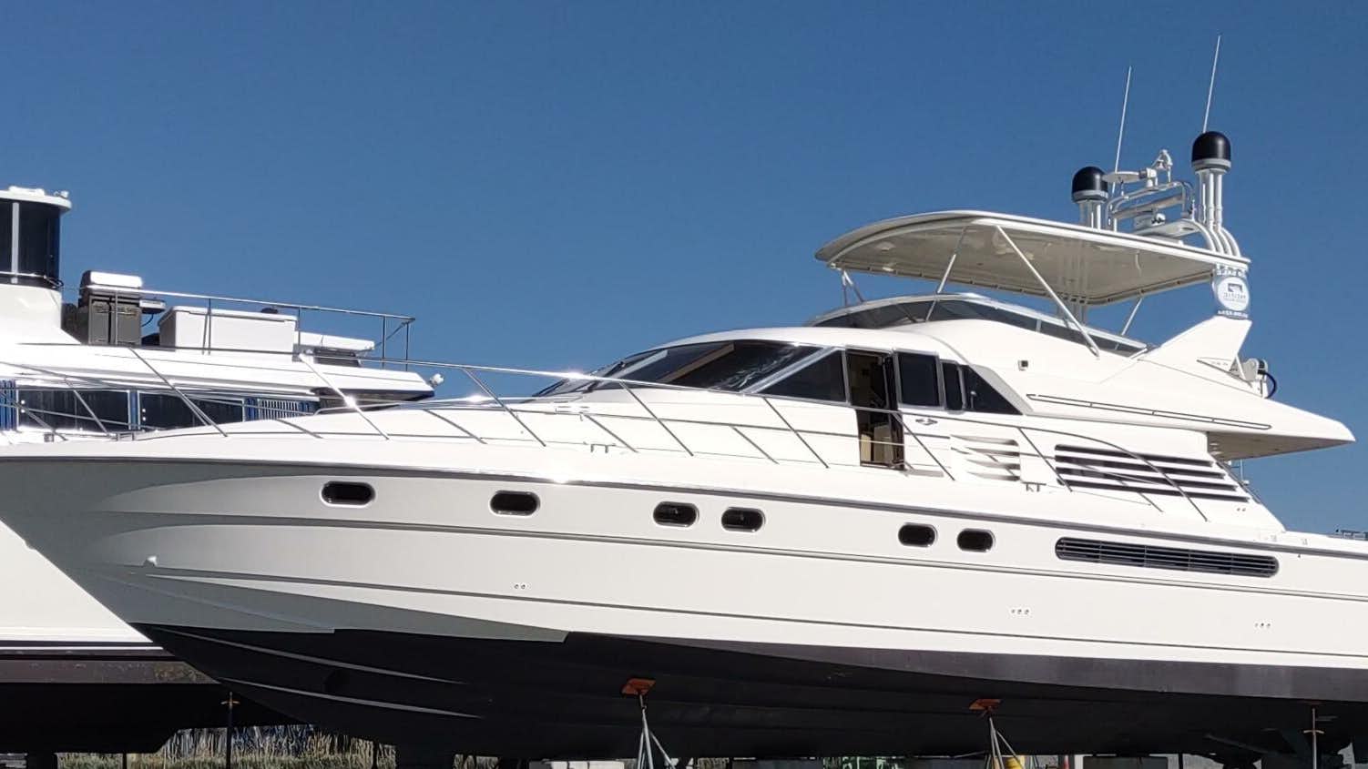 a couple of large yachts aboard F66 Yacht for Sale