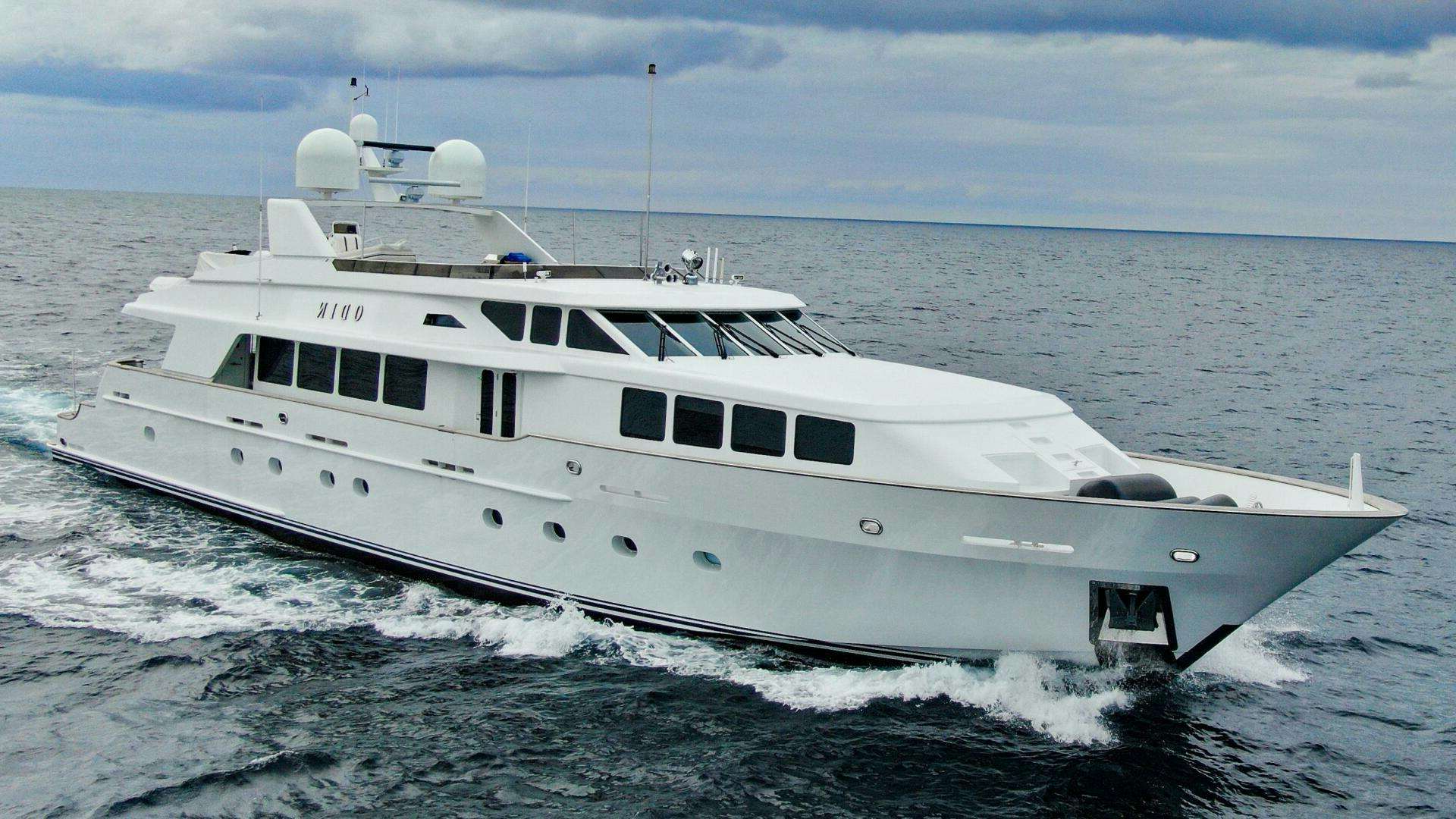 a white yacht in the water aboard ODIN Yacht for Sale