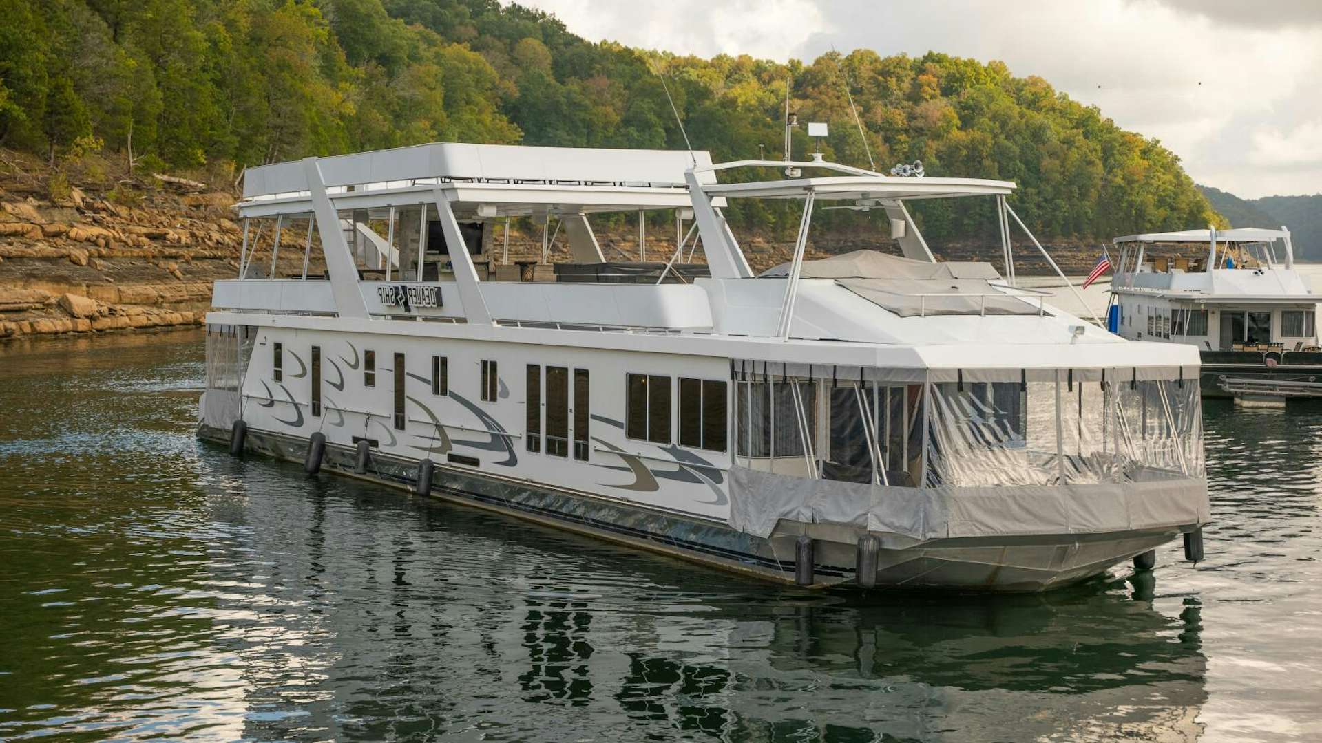 a white boat on the water aboard SUNSTAR Yacht for Sale