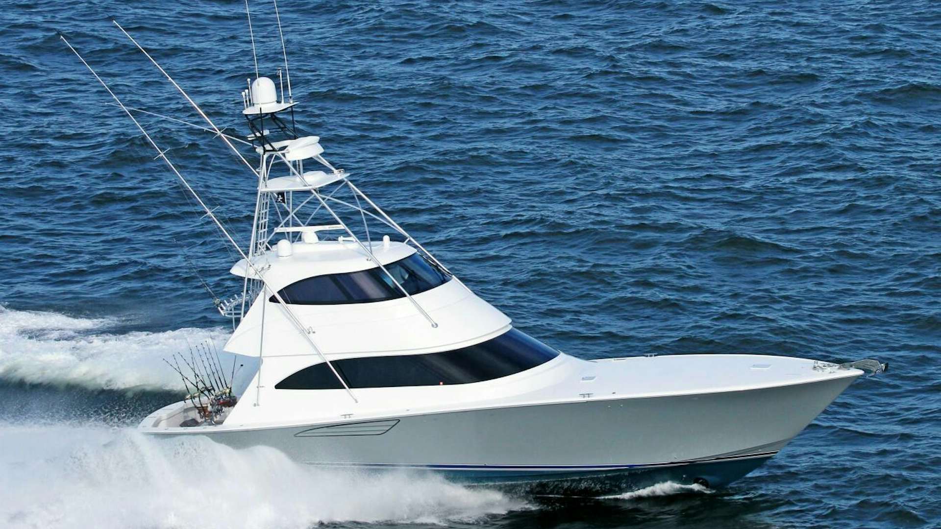 a white yacht in the water aboard TORTA Yacht for Sale