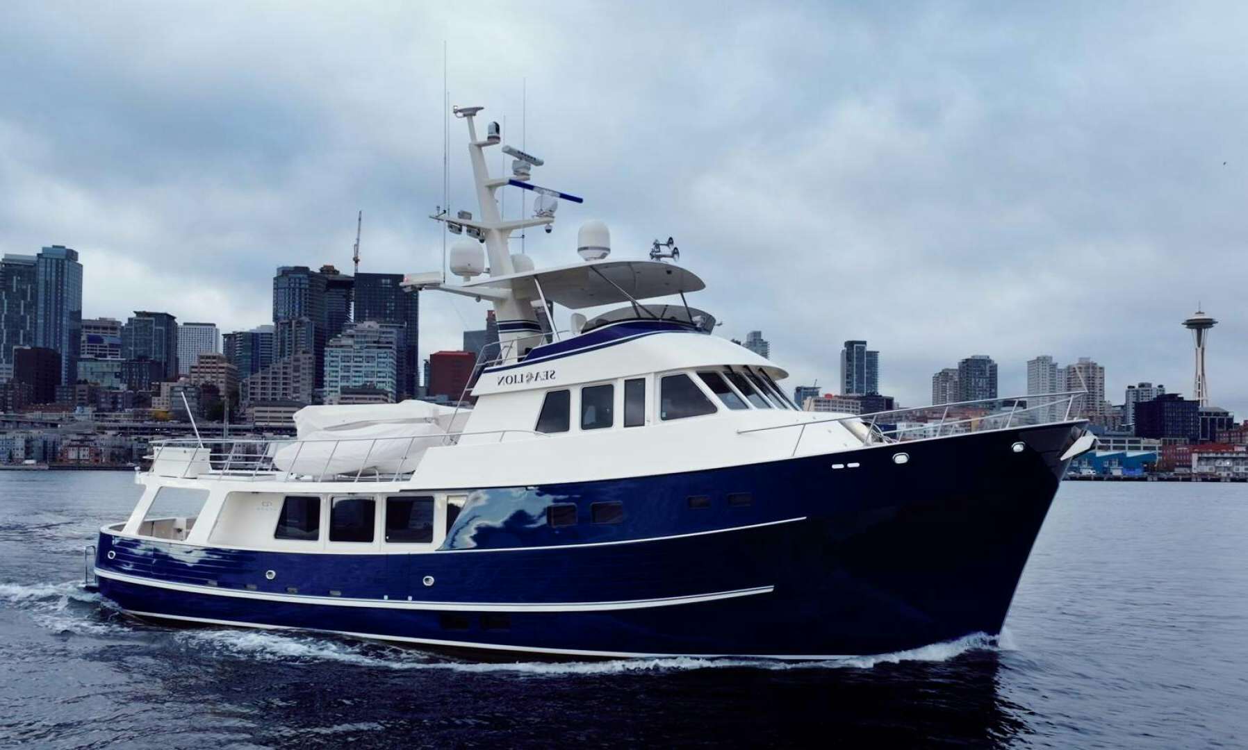 a large white boat in the water aboard SEA LION Yacht for Sale