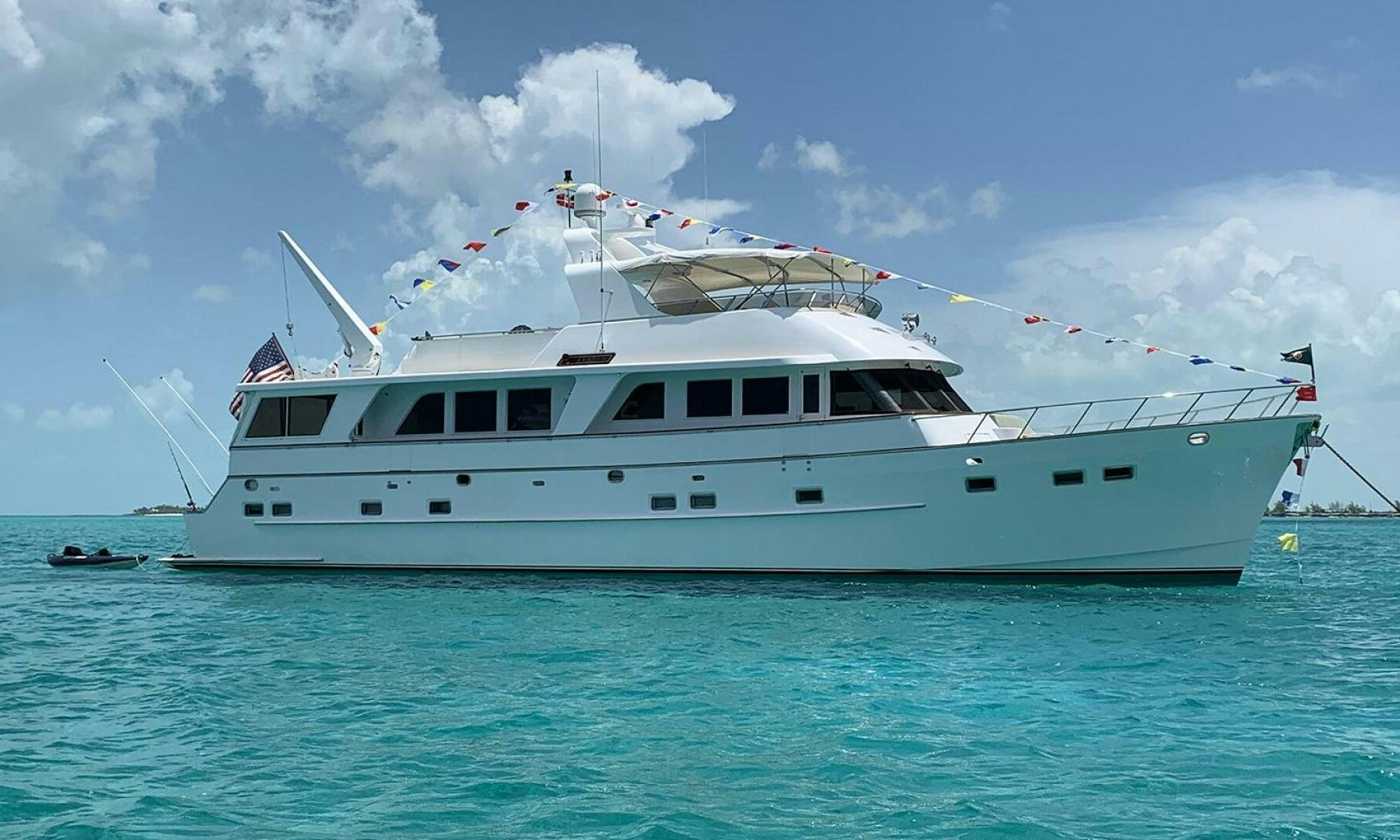 a white boat in the water aboard SHAMROCK Yacht for Sale