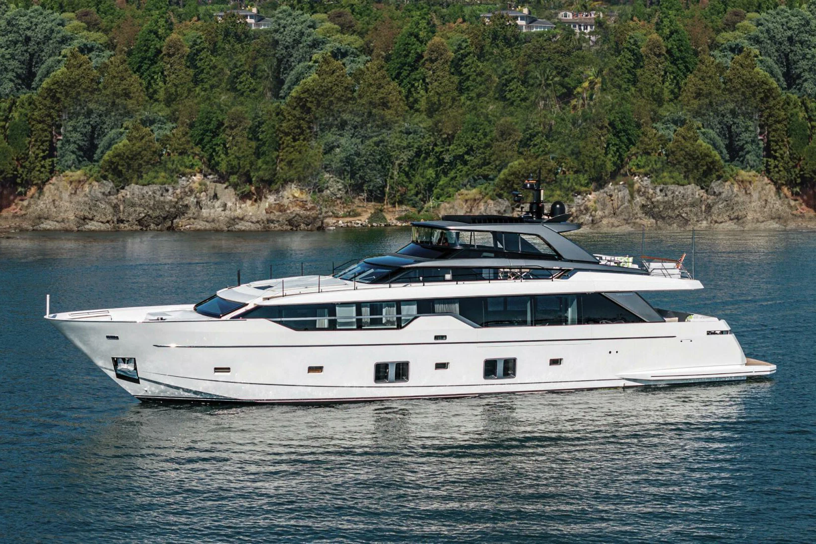 a white yacht on the water aboard GENOA Yacht for Sale