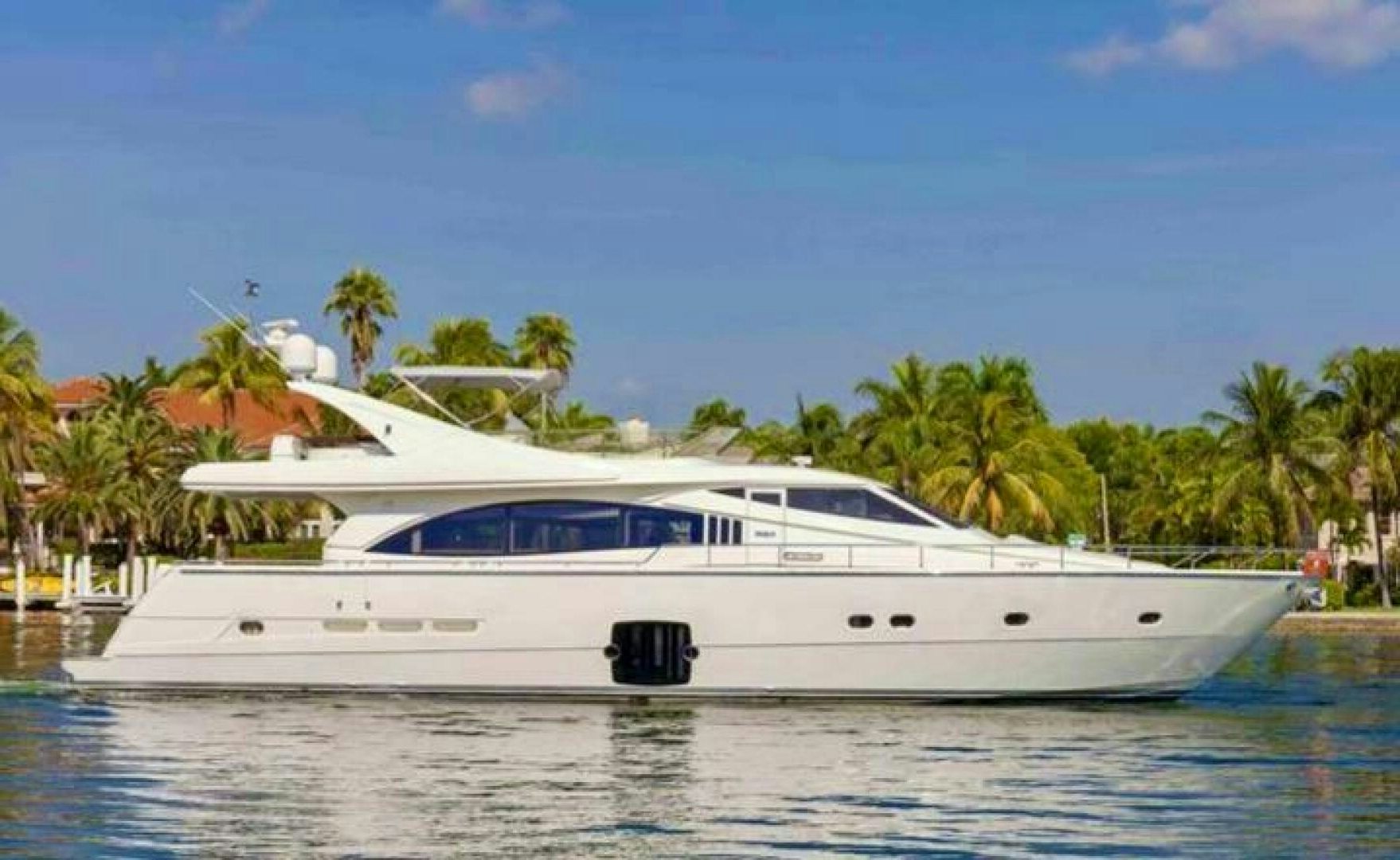 a white yacht on the water aboard SEDROP Yacht for Sale