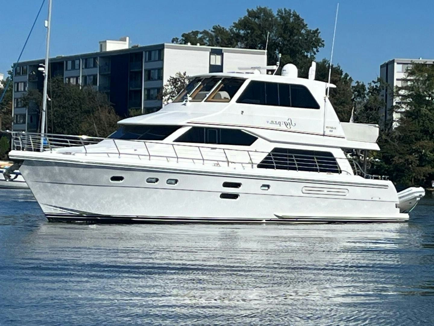 a white yacht in the water aboard SIG:PRN Yacht for Sale