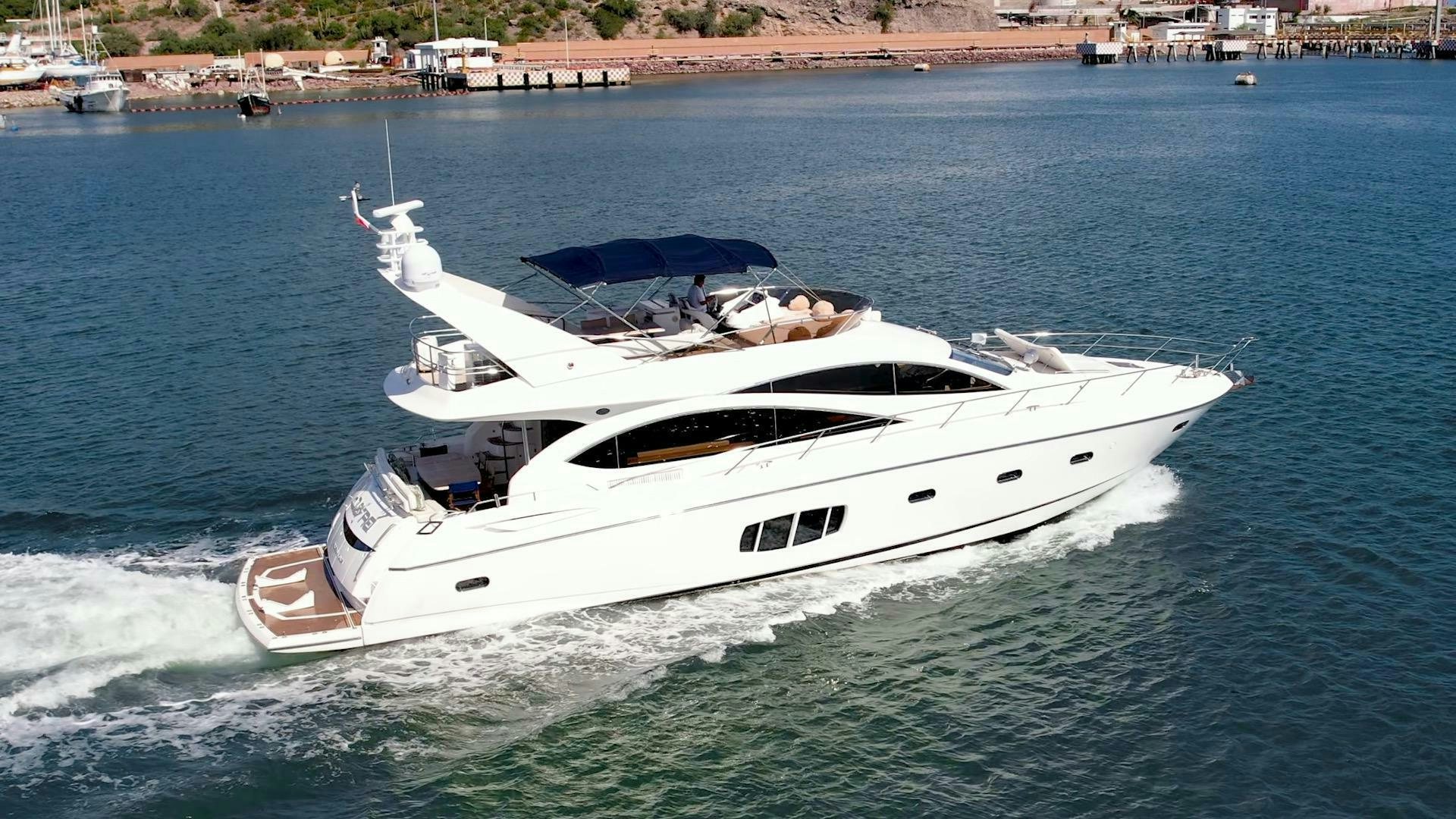 a white yacht on the water aboard BAR&CO Yacht for Sale