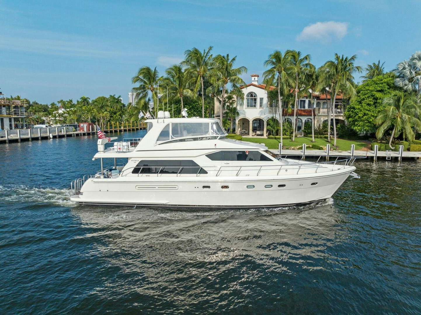 a white boat on water aboard FUN@SEA.CALM Yacht for Sale