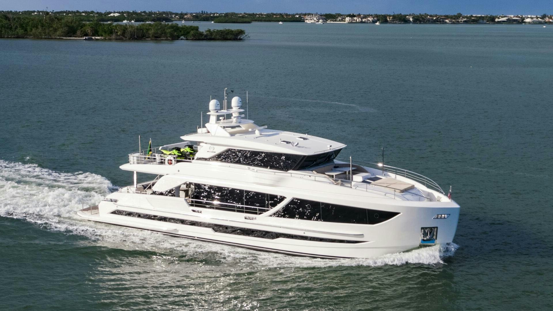 a white boat on the water aboard AQUA LIFE Yacht for Sale