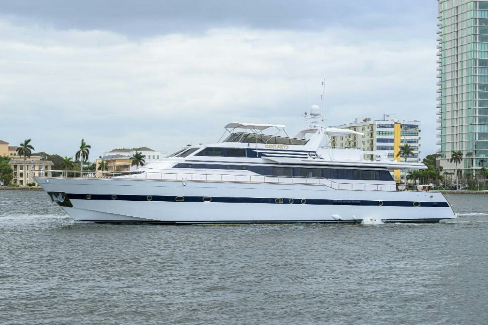 a large white boat on the water aboard CIPANGO Yacht for Sale