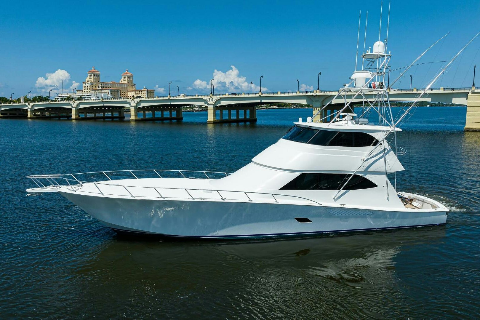 a white yacht in the water aboard CABALLO GRANDE Yacht for Sale