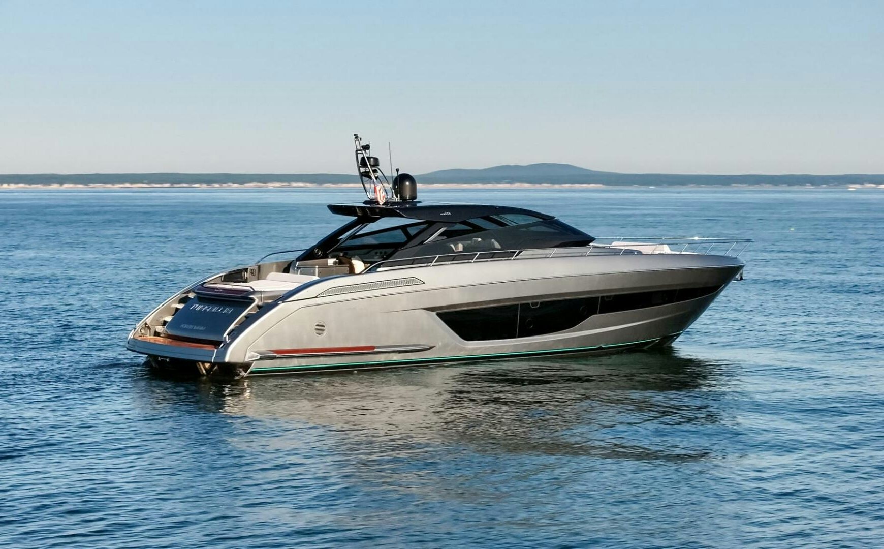 a white yacht in the water aboard BLUEPRINT Yacht for Sale