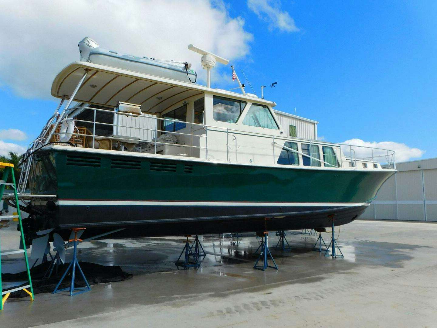 a boat on a trailer aboard DOLPHIN Yacht for Sale