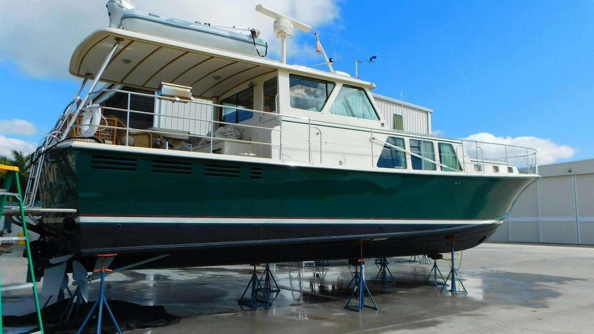 a boat on a trailer aboard DOLPHIN Yacht for Sale