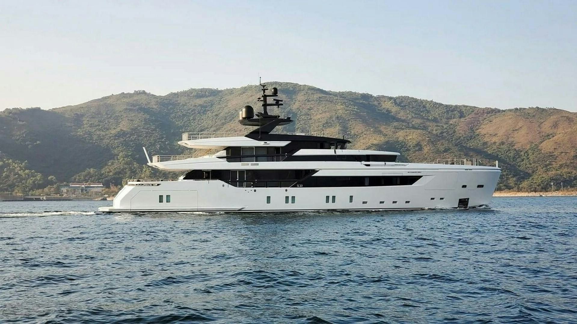 a large white boat in the water aboard KAMAKASA Yacht for Sale