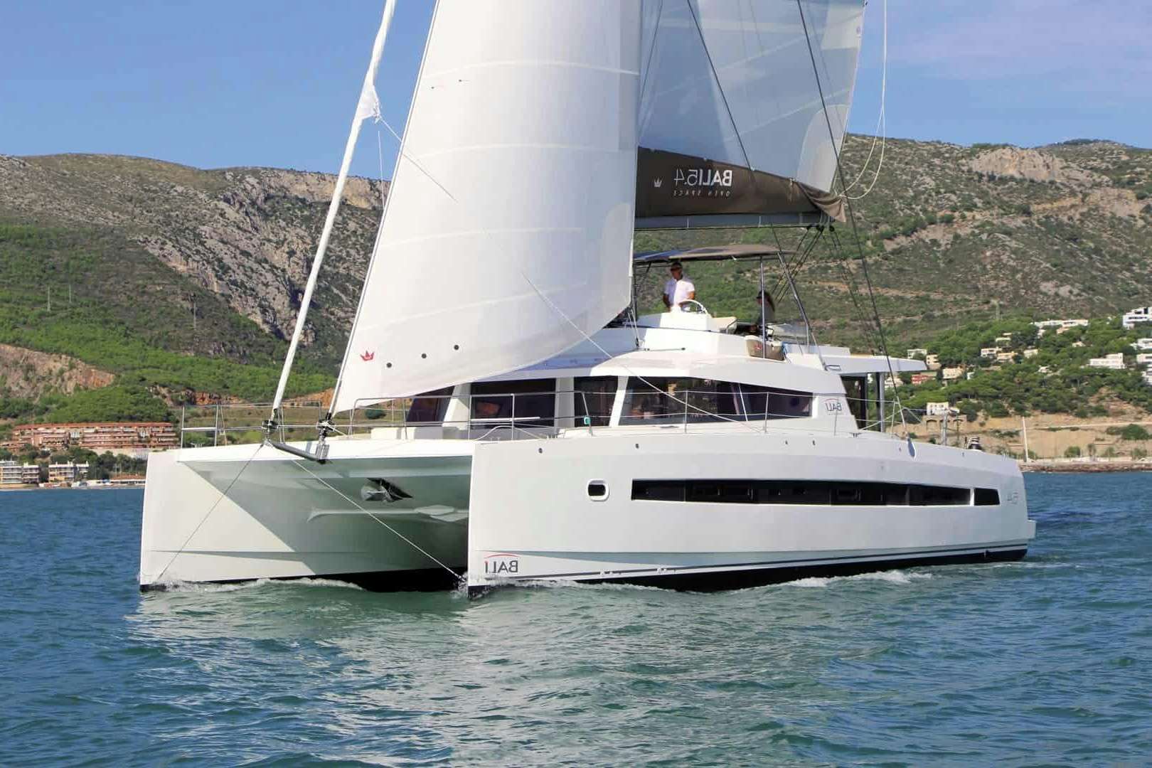 a white boat on water aboard GRENADA Yacht for Sale