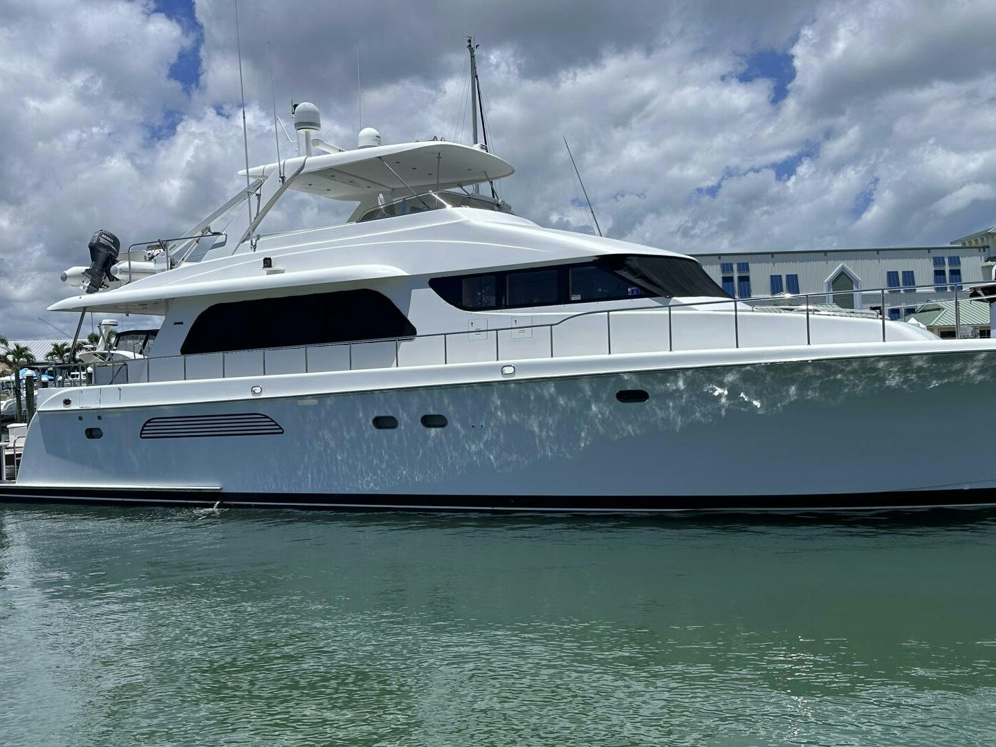 a white yacht in the water aboard RECYCLING MADE CENTS Yacht for Sale