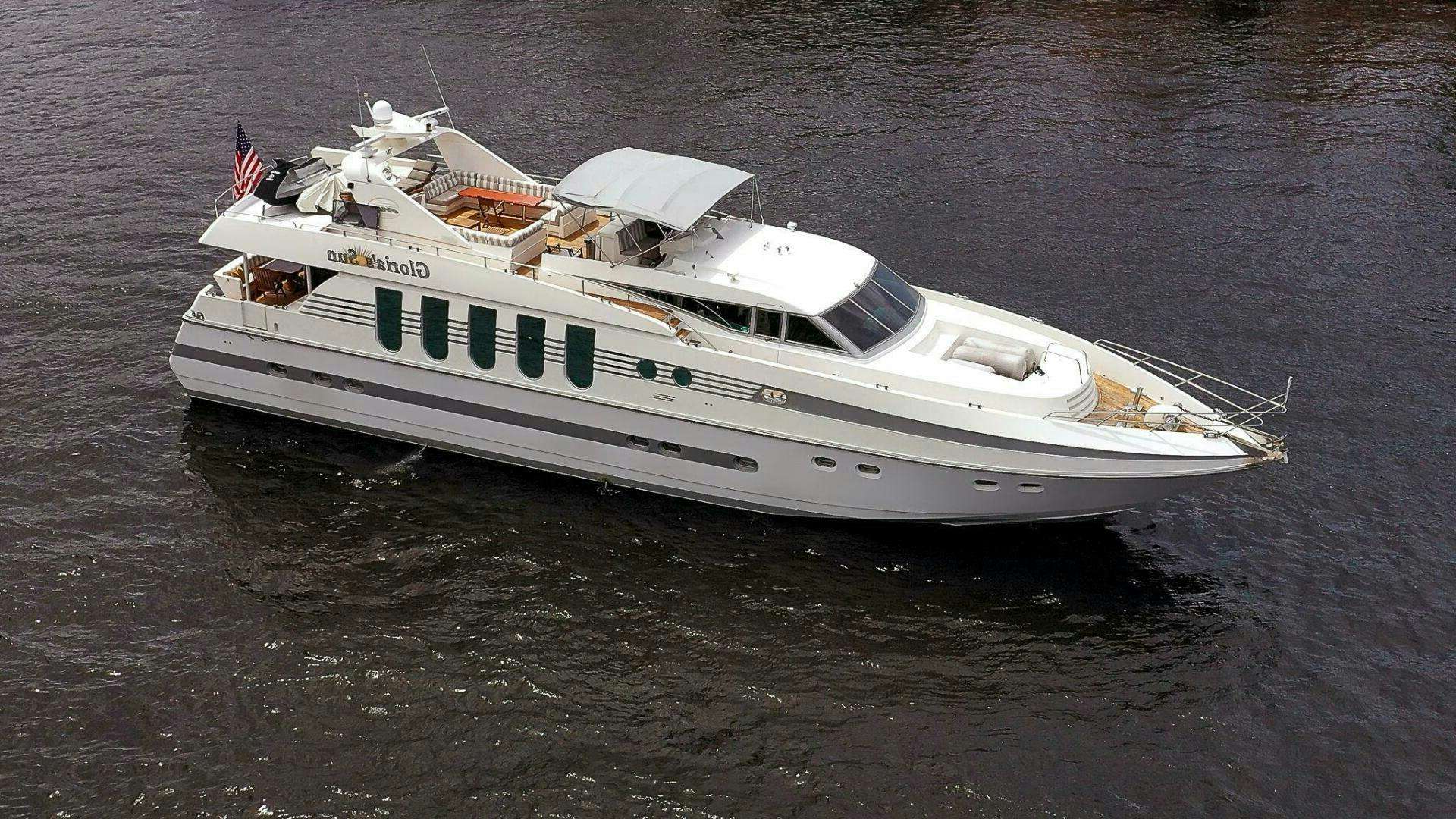 a white boat on the water aboard GLORIAS SUN Yacht for Sale