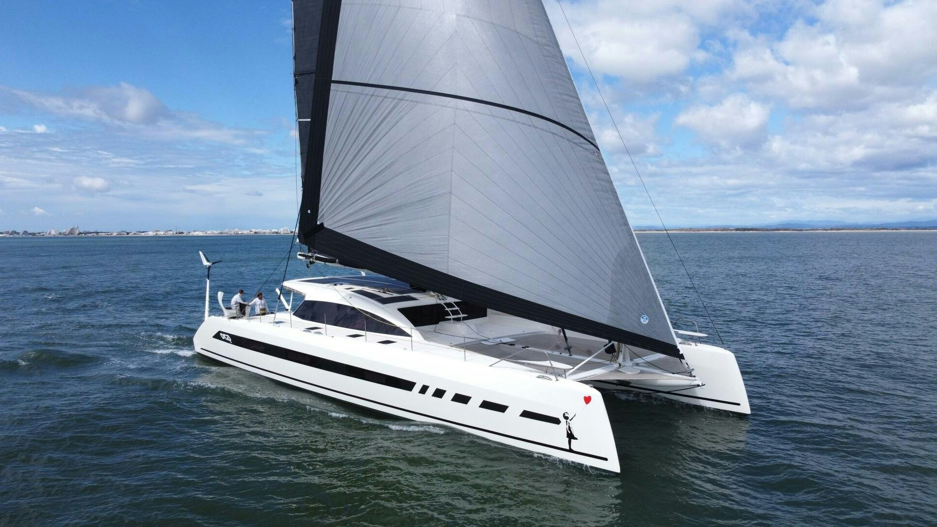 a white boat on the water aboard CATCH ME Yacht for Sale
