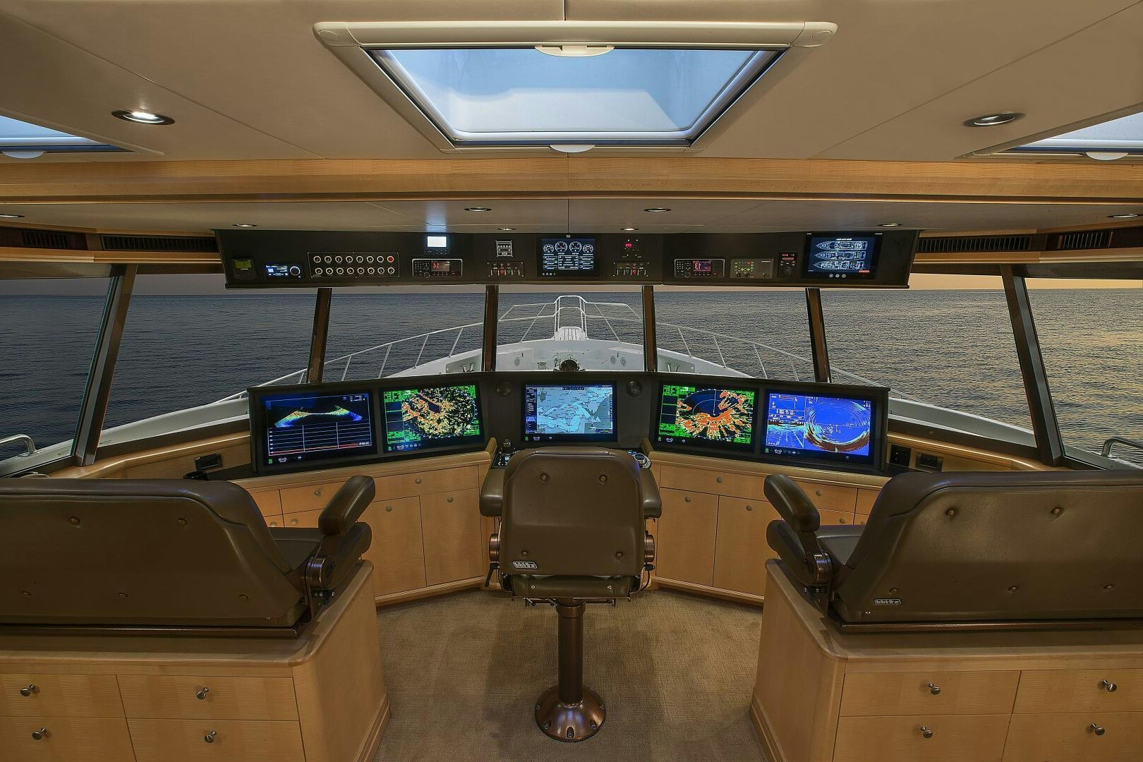 a row of seats on a boat aboard CAZADOR Yacht for Sale