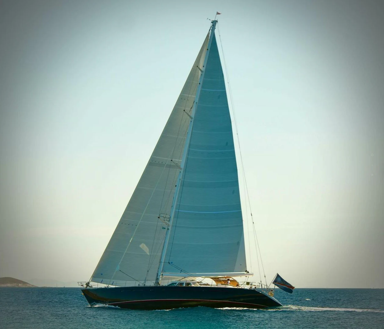 a sailboat on the water aboard IKARON Yacht for Sale