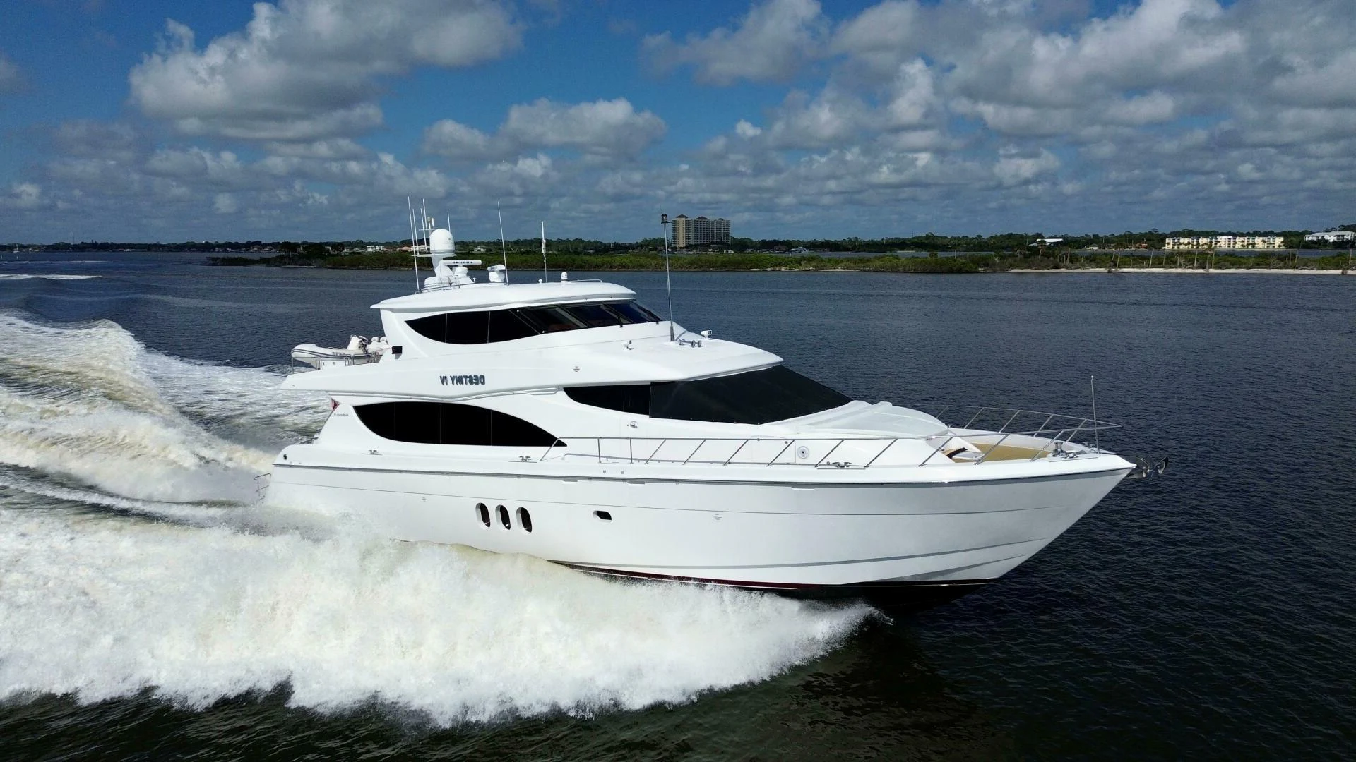 a white yacht on water aboard TIME-2 FLY Yacht for Sale