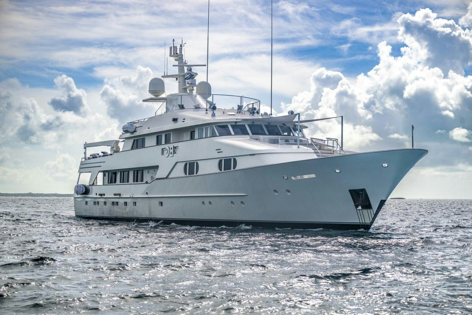 a large white boat in the water aboard BG Yacht for Sale