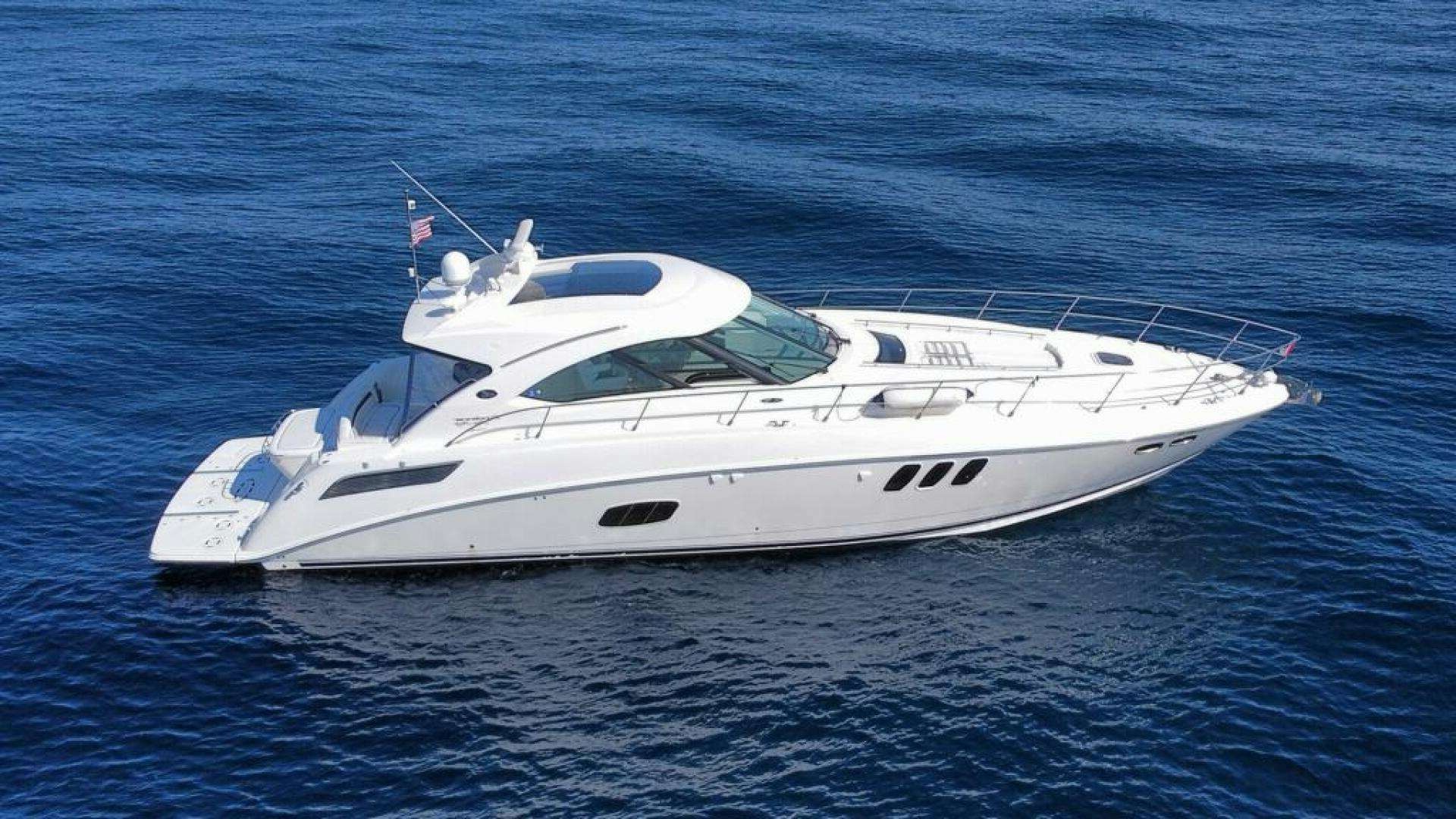 a white yacht in the water aboard ROW IT Yacht for Sale