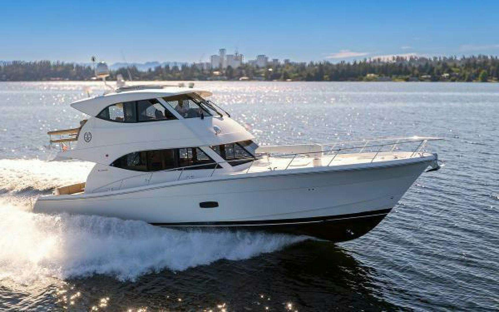 a white yacht on the water aboard THE COURTSHIP Yacht for Sale