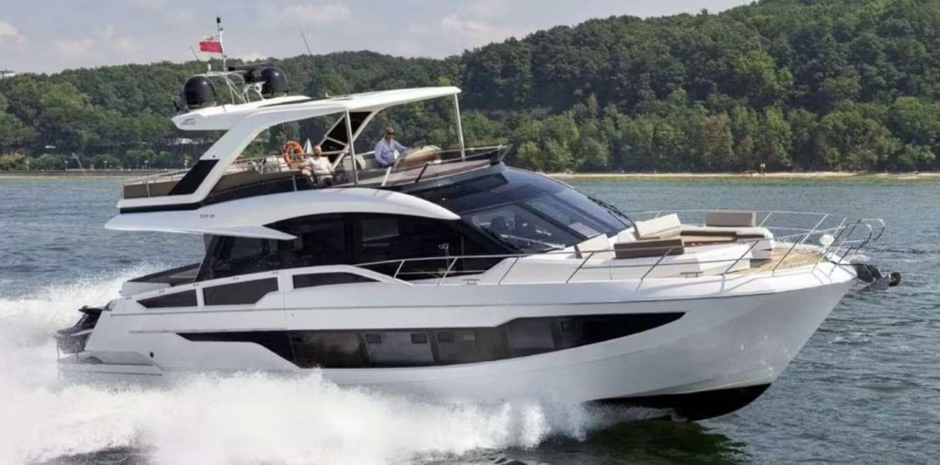 a boat on the water aboard TRIPLE T Yacht for Sale