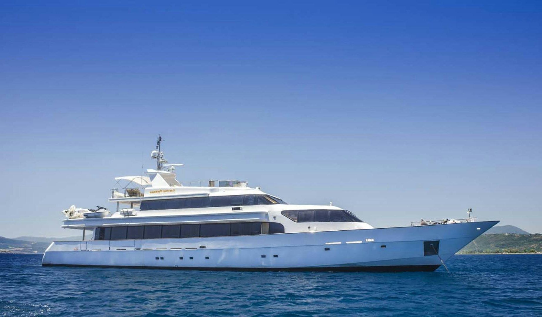 a white yacht in the water aboard CARMEN FONTANA Yacht for Sale