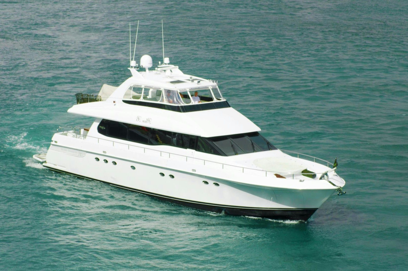 a white yacht in the water aboard PLAN B Yacht for Sale