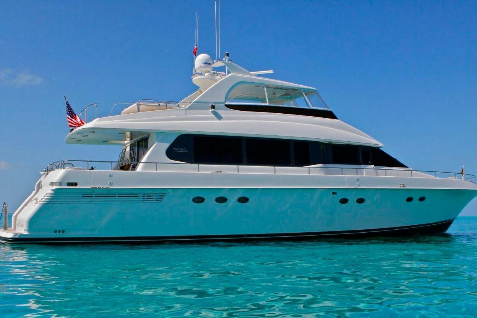 a large white boat in the water aboard COMPANIONSHIP Yacht for Sale
