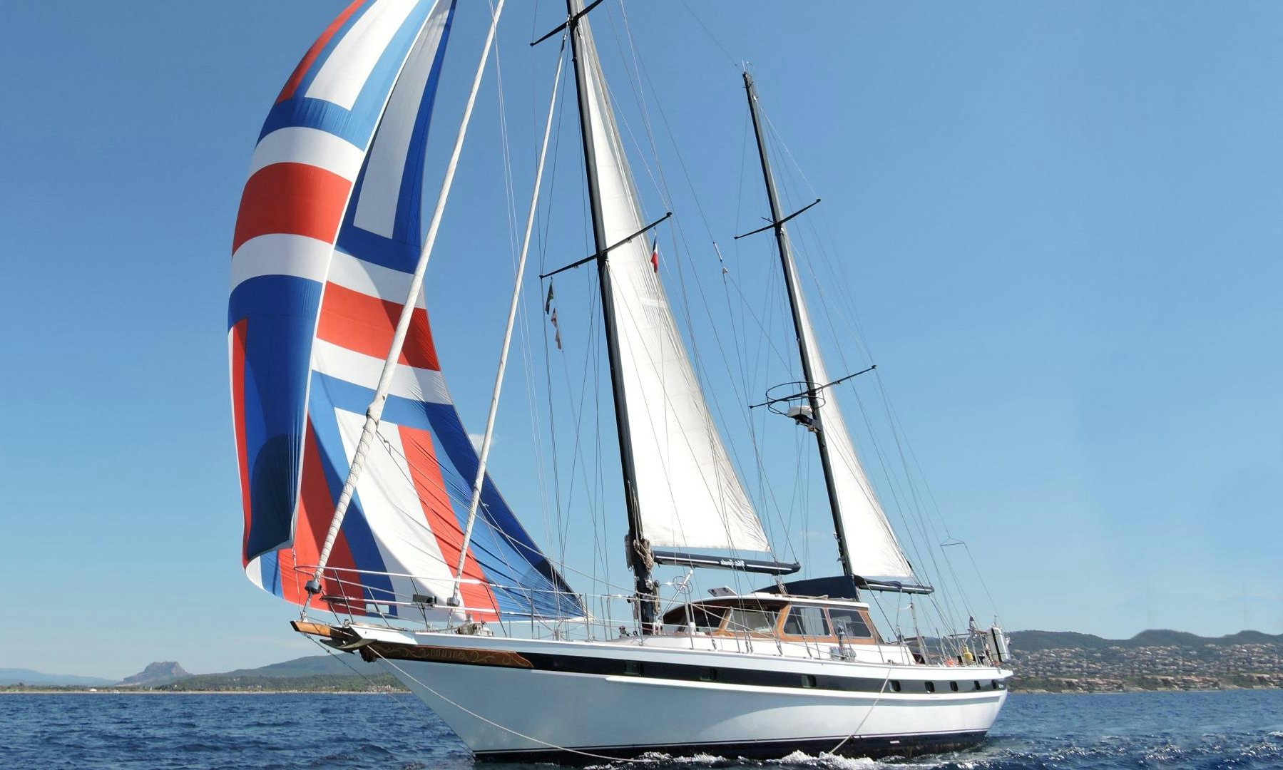 a sailboat on the water aboard WHITE GARUDA Yacht for Sale