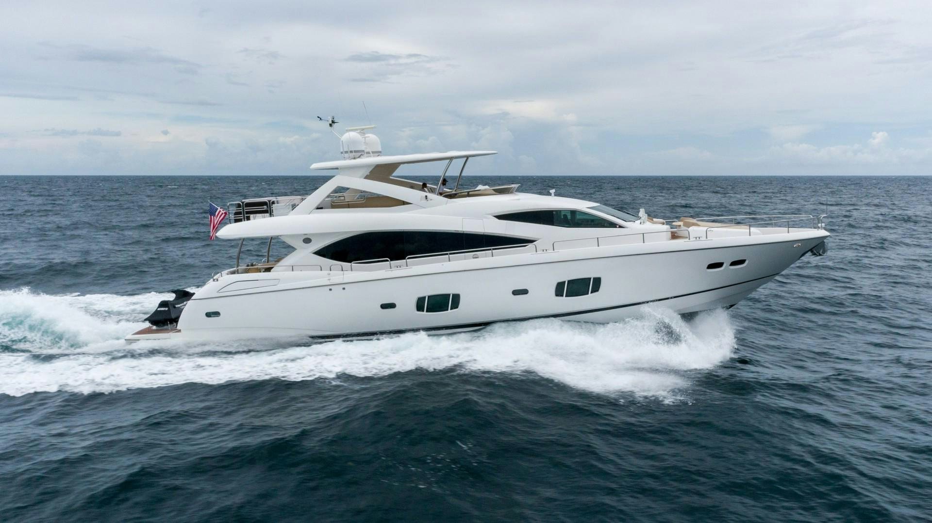 a white yacht in the water aboard SPLASHED OUT Yacht for Sale