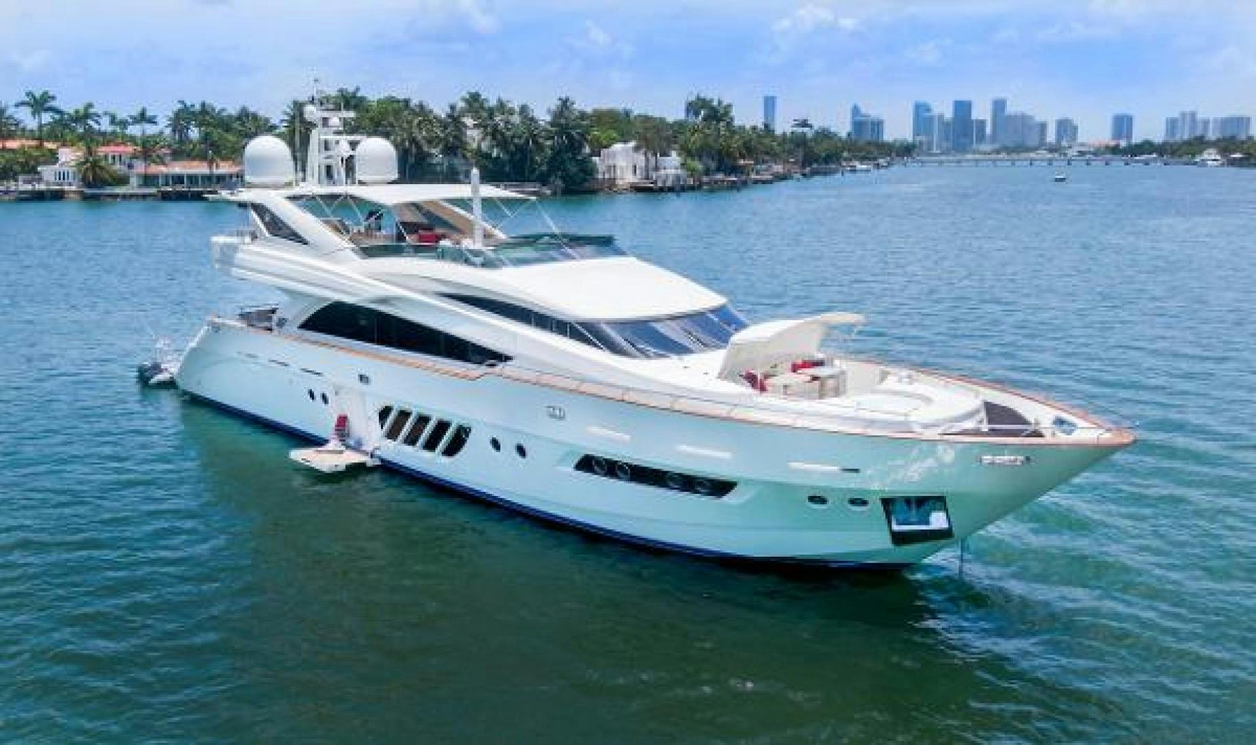 a white yacht on the water aboard CASUAL Yacht for Sale