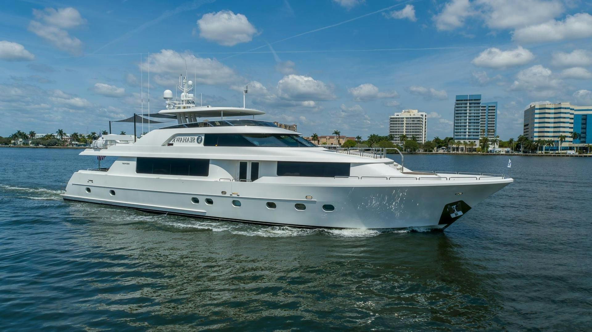 a white yacht on the water aboard SEAHAWK Yacht for Sale