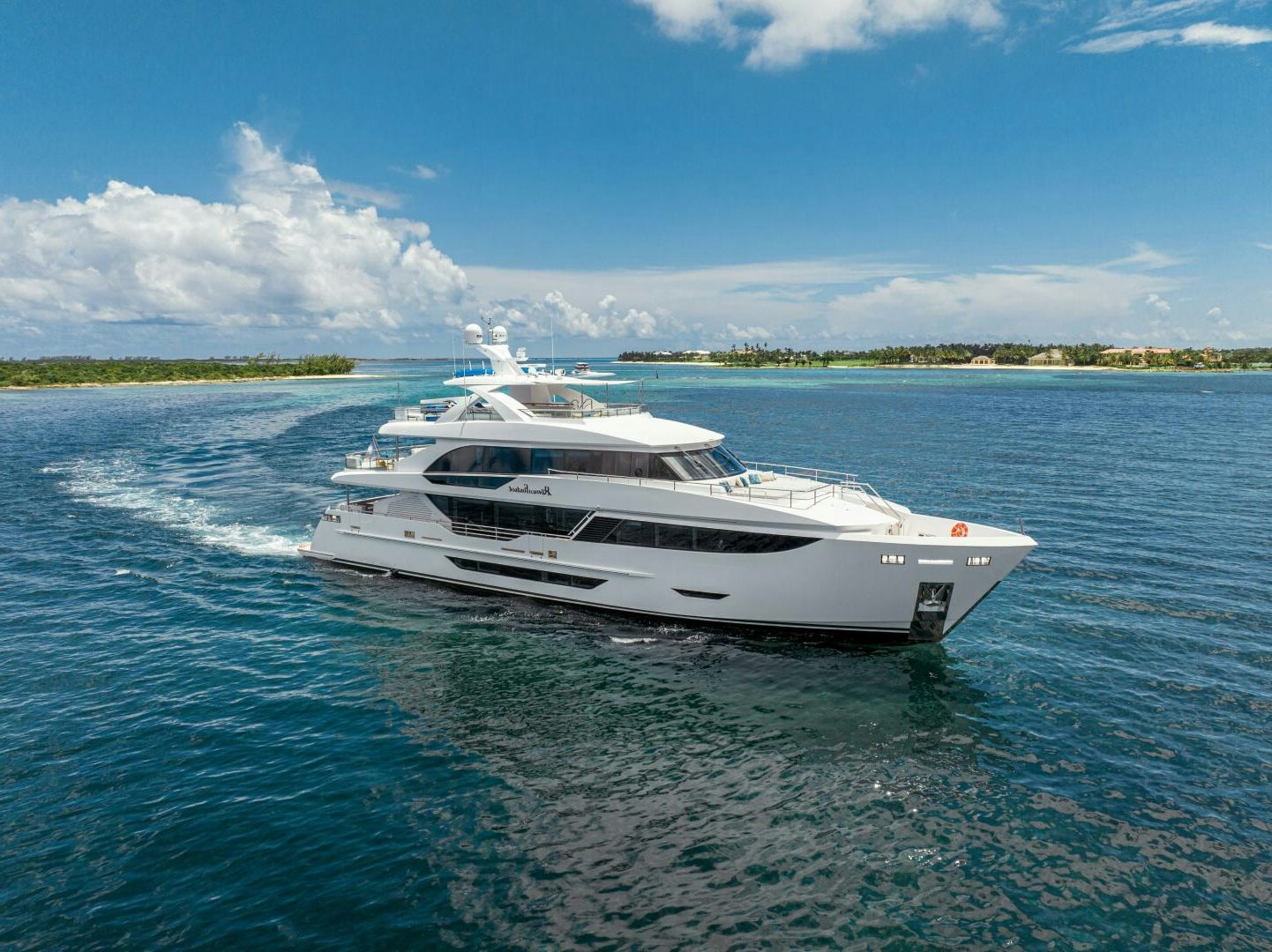a white yacht in the water aboard RF I Yacht for Sale