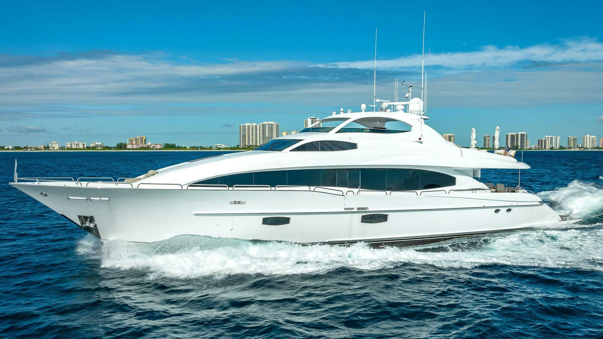 a white yacht on the water aboard SERENITY Yacht for Sale