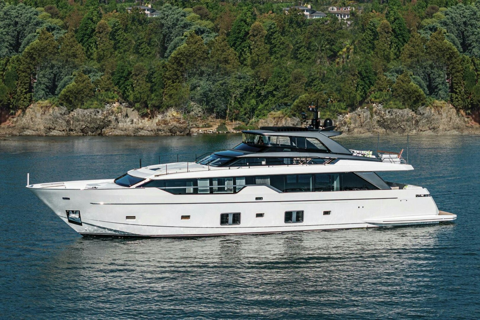 a white yacht on the water aboard GENOA Yacht for Sale