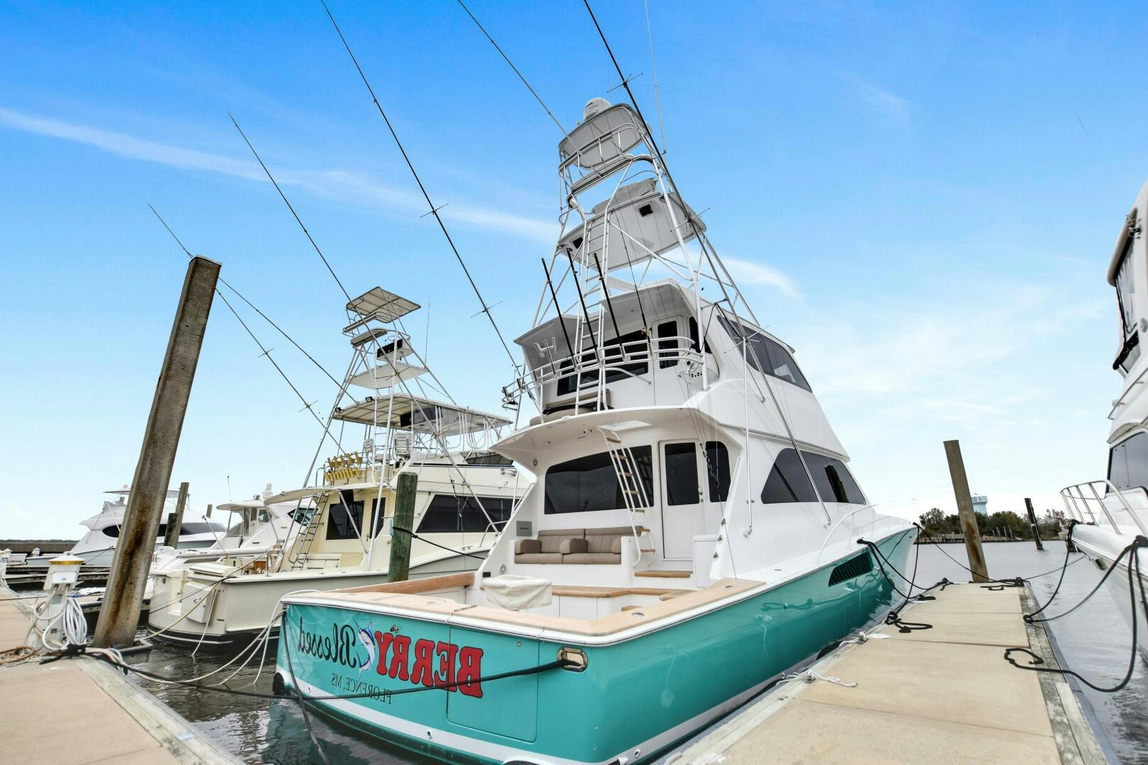 a boat docked at a pier aboard BERRY BLESSED Yacht for Sale