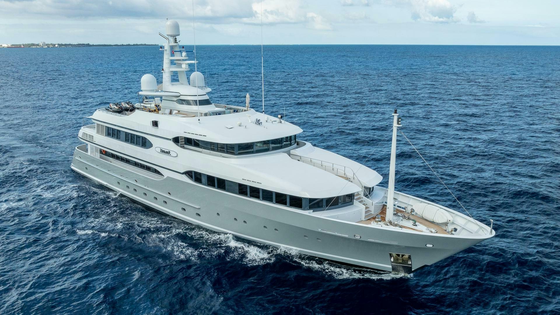 a white yacht in the water aboard AMANTI Yacht for Sale