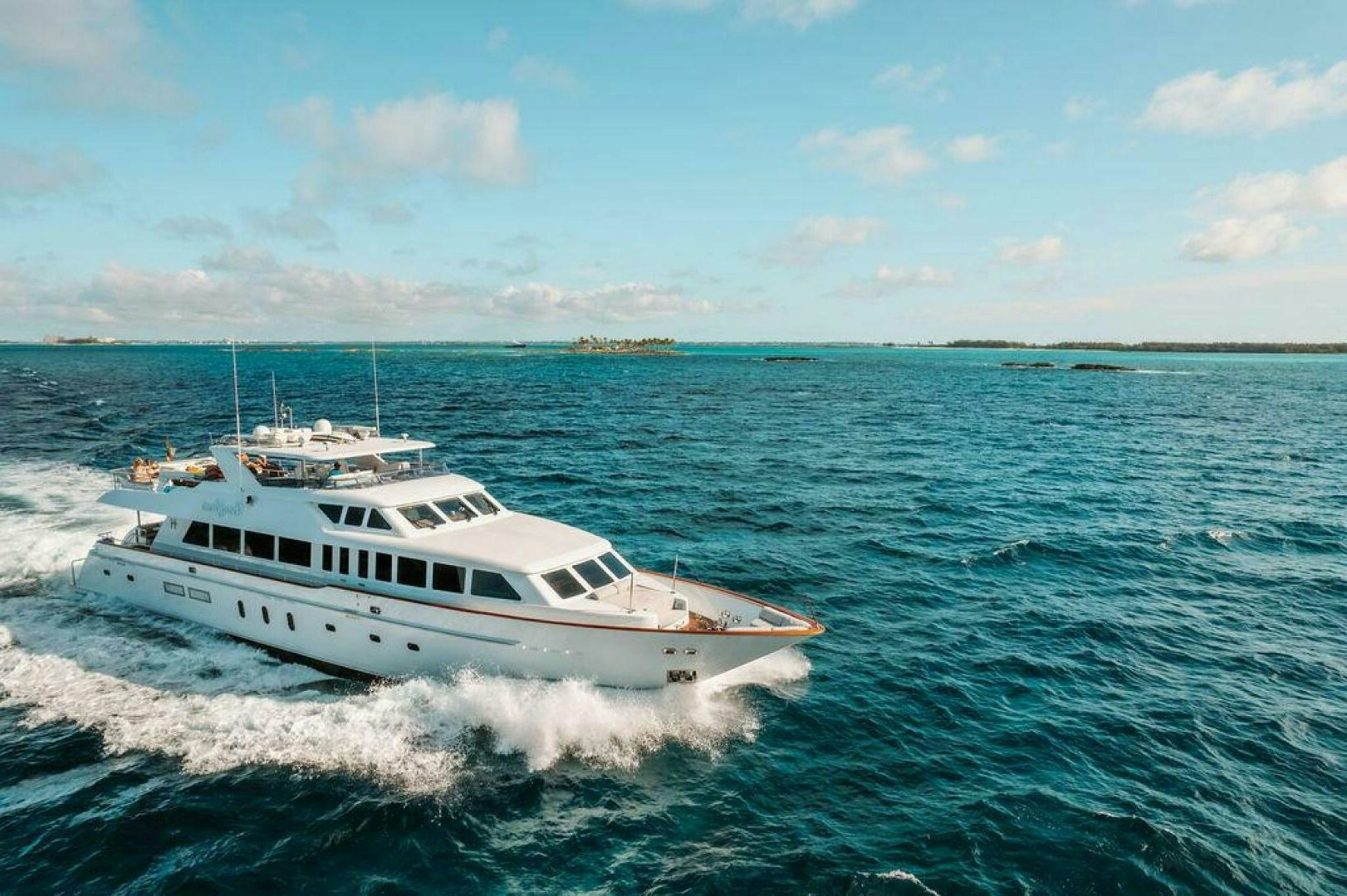 a boat on the water aboard BEACHFRONT Yacht for Sale