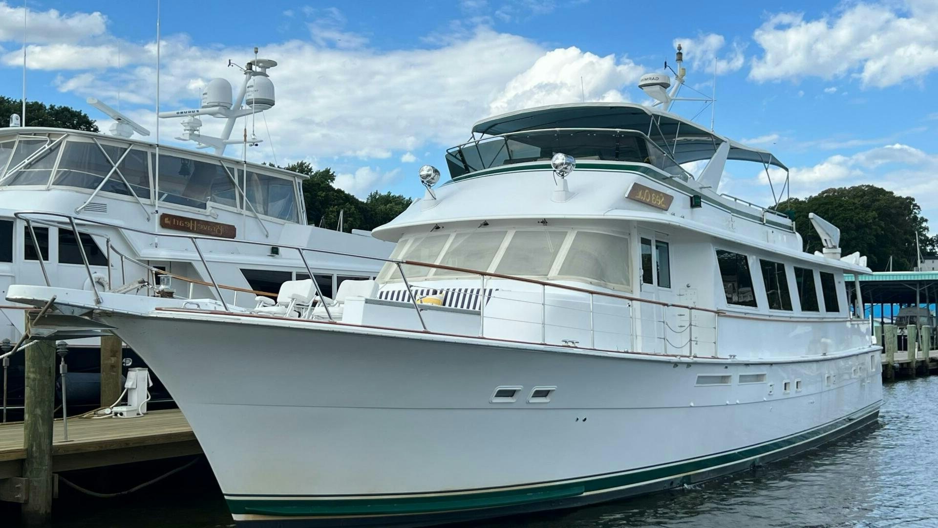 a couple of boats are parked in a dock aboard SEA OWL Yacht for Sale
