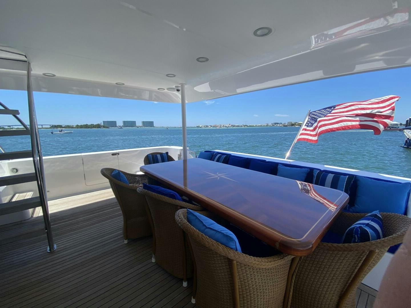 a deck with chairs and umbrellas aboard LIFE'S A JOURNEY Yacht for Sale