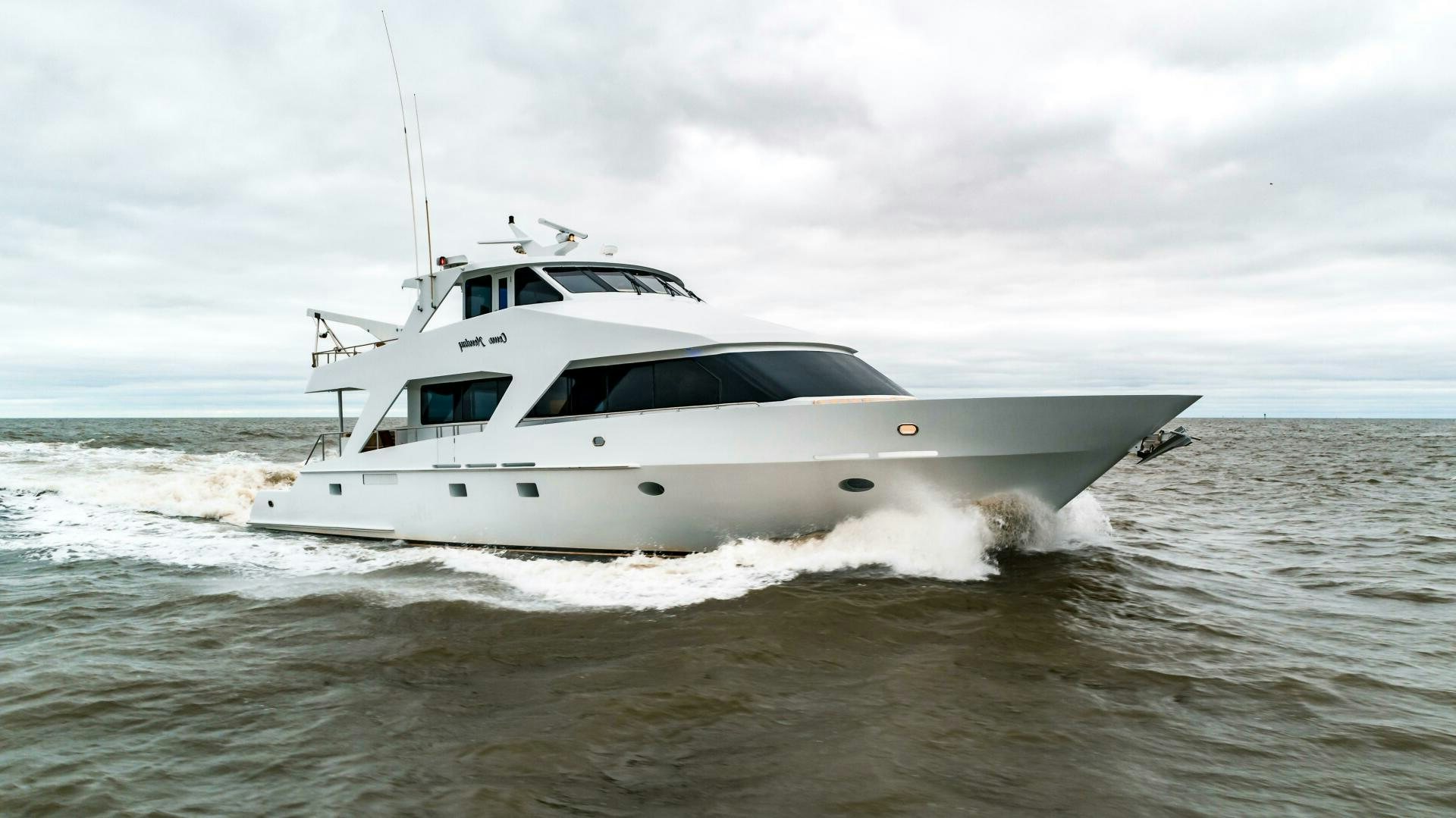 a white boat in the water aboard BUSINESS TRIP 2 Yacht for Sale