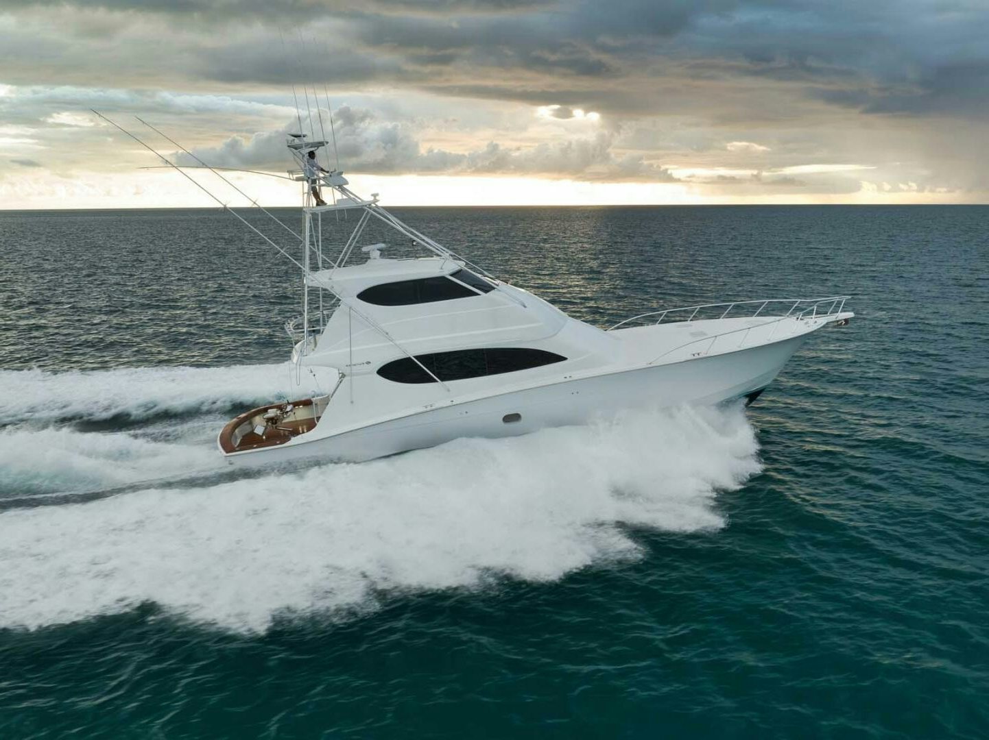 a white boat in the water aboard REEL TRADER Yacht for Sale