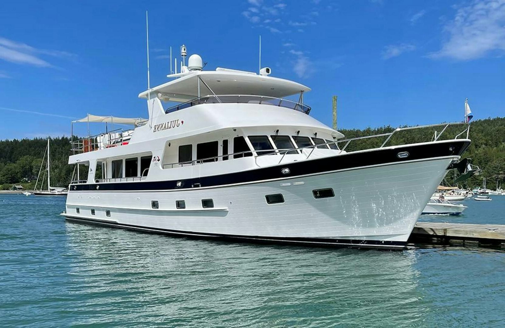 a white boat on the water aboard JULIANNE Yacht for Sale
