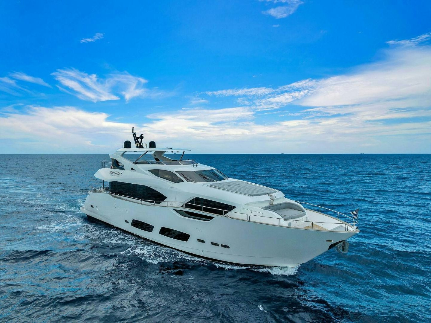 a white yacht in the water aboard KARILLIAN & COMPANY Yacht for Sale