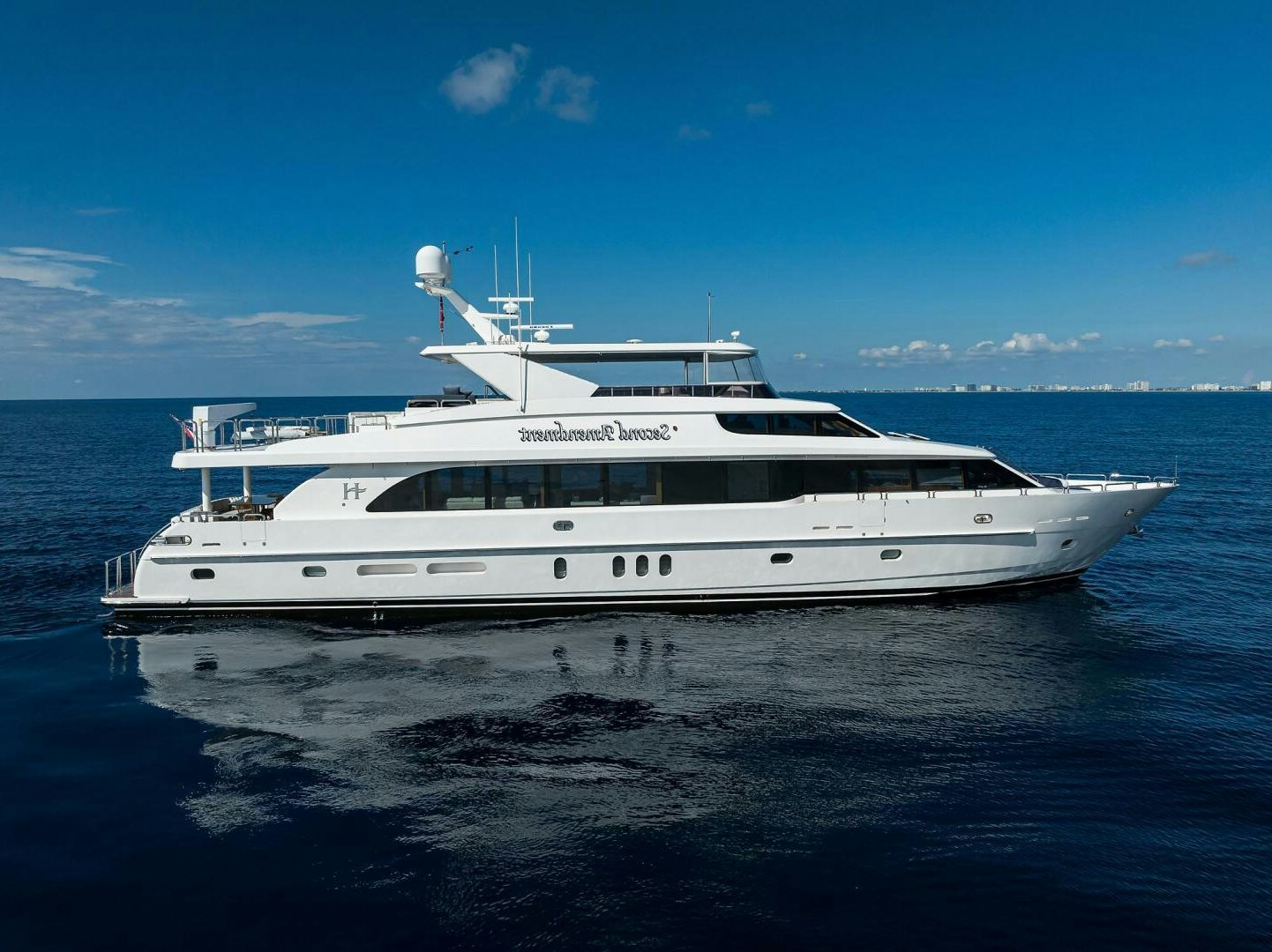 a white yacht in the water aboard SECOND AMENDMENT  Yacht for Sale